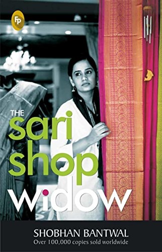 Book cover of 'The Sari Shop Widow' by Shobhan Bantwal with a woman behind a sari display.