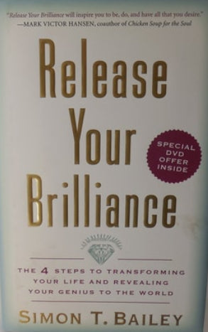 Book titled 'Release Your Brilliance' by Simon T. Bailey on a light background