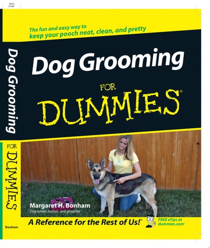 Book cover of 'Dog Grooming For Dummies' with a woman and dog on a grassy background.