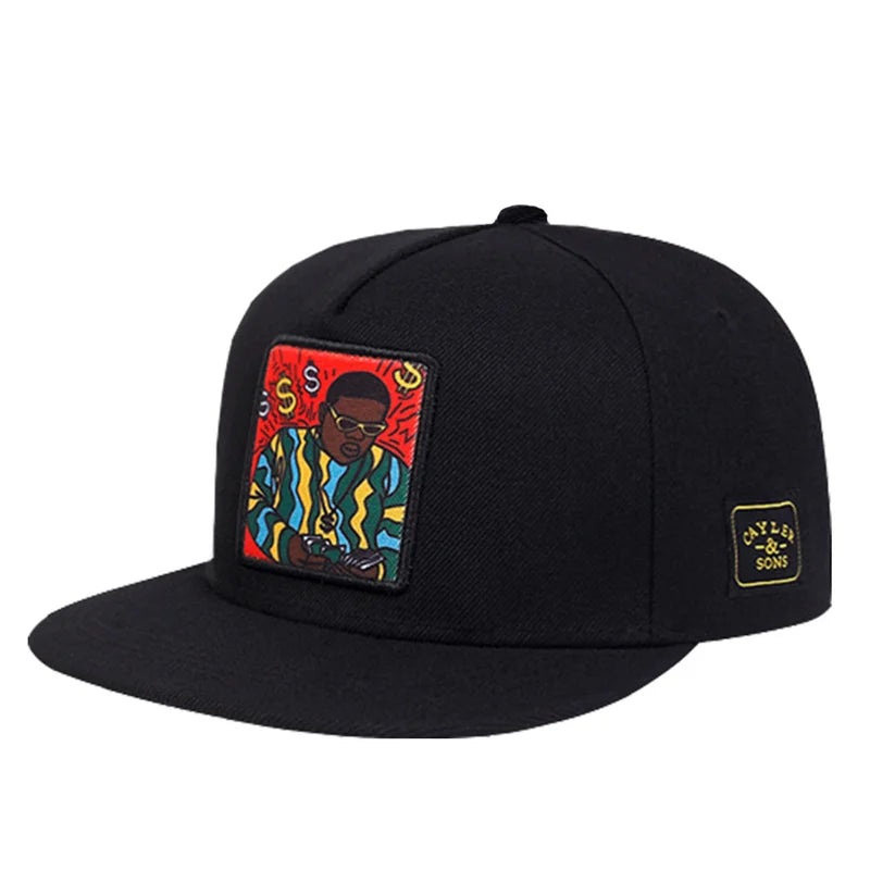 Biggie in the Coogie Sweater cap in all black from '2Pac & B.I.G. Immortal Legends Snapback Collection | All Hats OSFA' on Bust-Down.