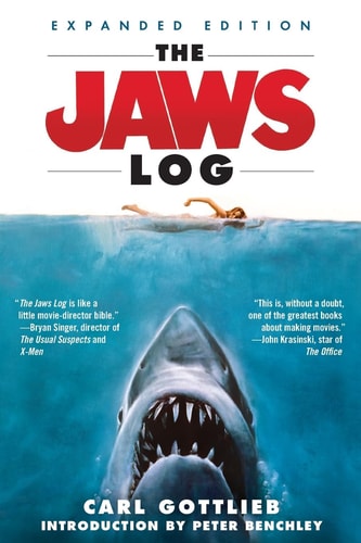 The cover of 'The Jaws Log' by Carl Gottlieb features a shark with its mouth open, showcasing a classic and iconic imagery related to the movie 'Jaws'.