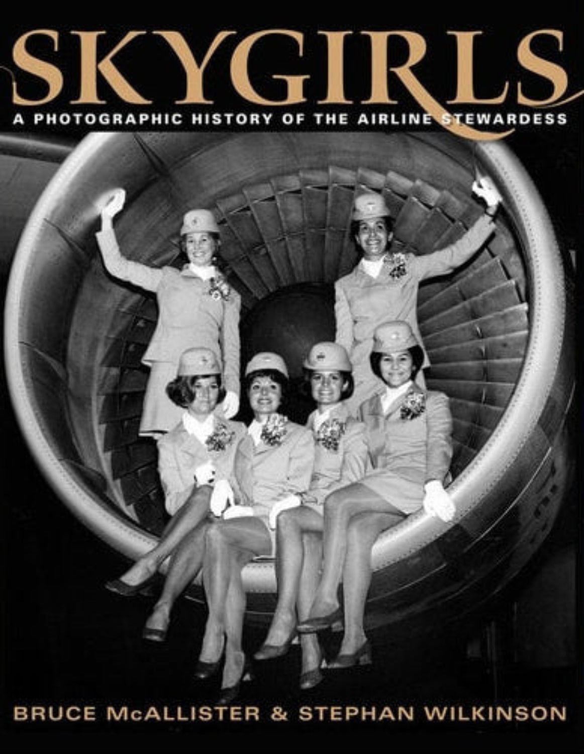 Book cover of 'Skygirls: A Photographic History of the Airline Stewardess' with black and white photo of stewardesses.