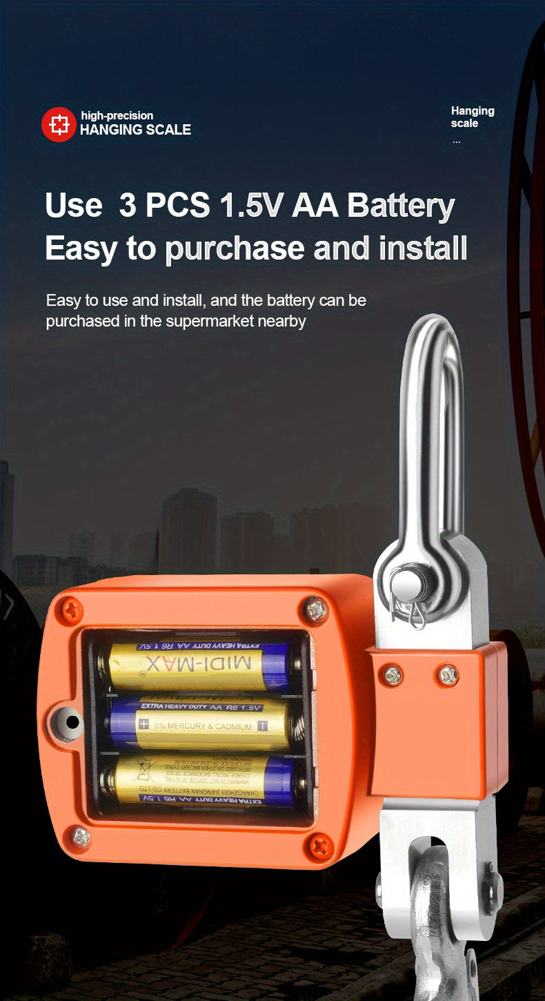 Orange hanging scale with battery compartment on a dark background