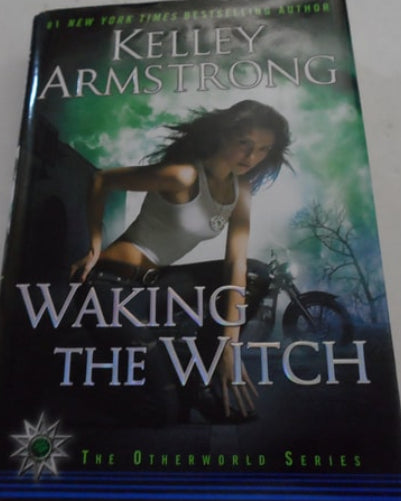 Book titled 'Waking the Witch' by Kelley Armstrong on a white background