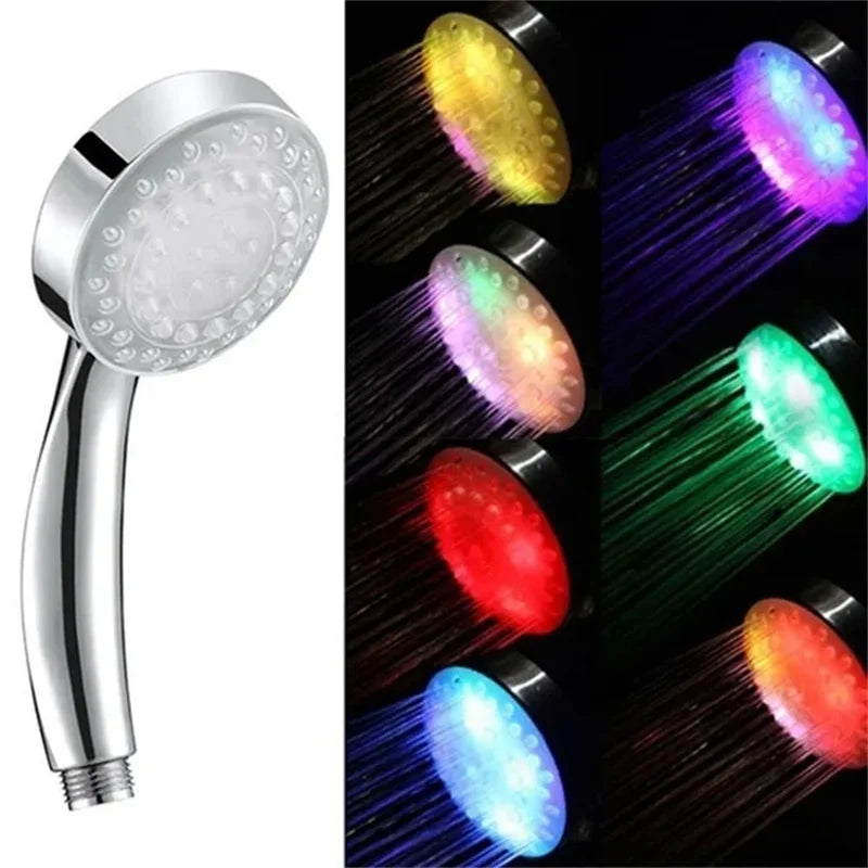 Chrome shower head with LED lights showing colorful water streams on a black background