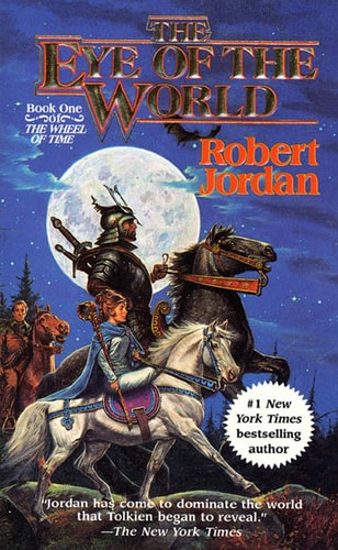 Book cover of 'The Eye of the World' by Robert Jordan with a warrior on horseback and a moonlit sky.