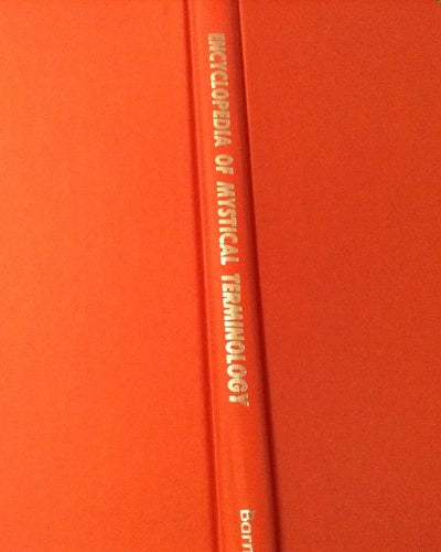 Red book titled 'Encyclopedia of Mystical Terminology' on a red background