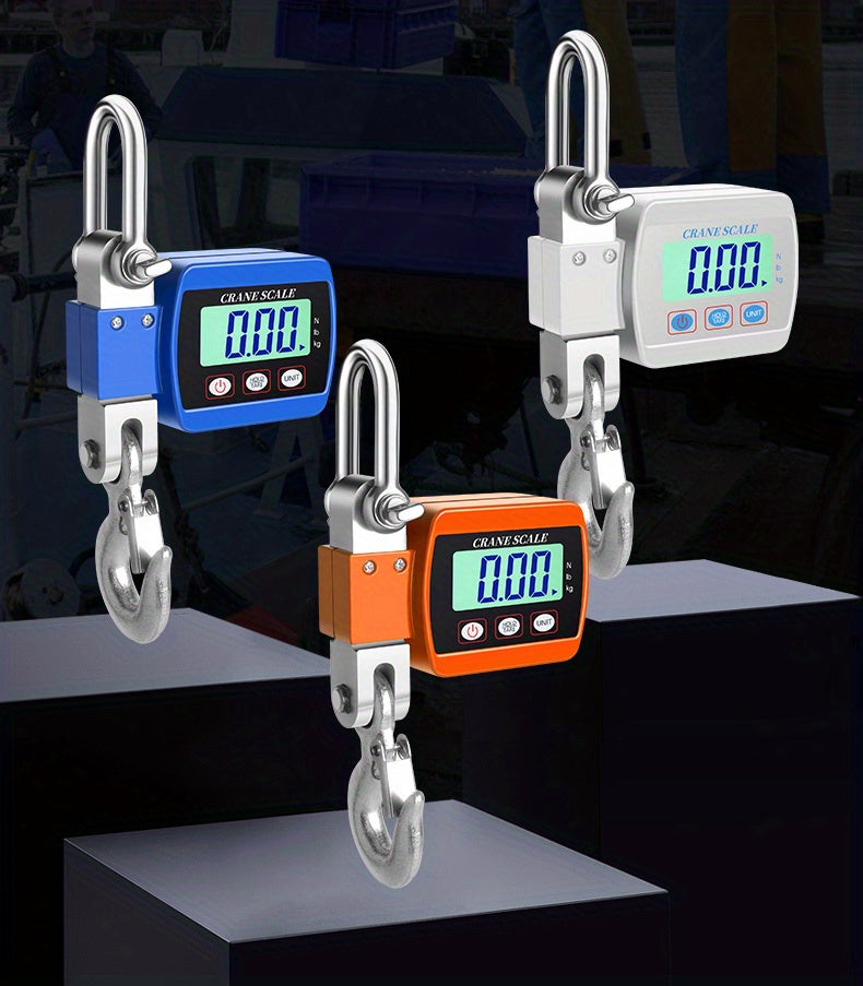 Three digital crane scales with different color displays on a reflective surface.