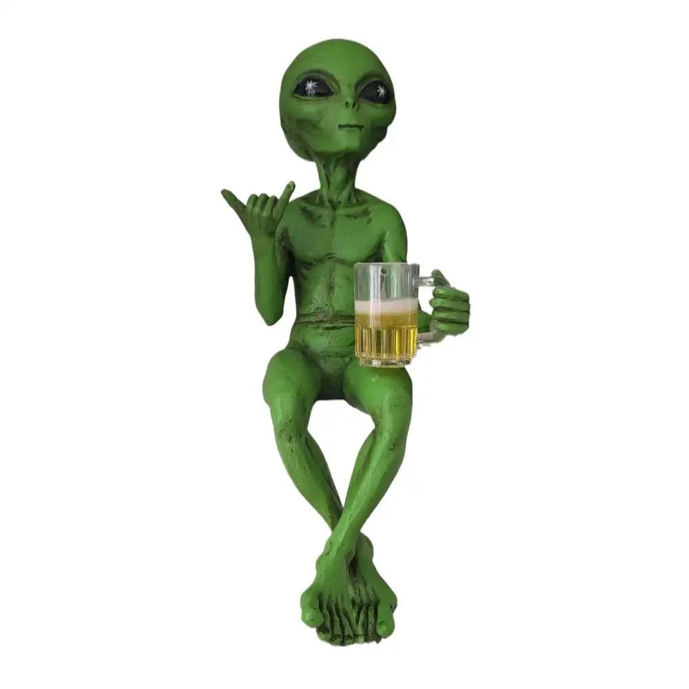 Close-up of the chill alien statue displaying detailed resin craftsmanship on the shaka and beer mug.
