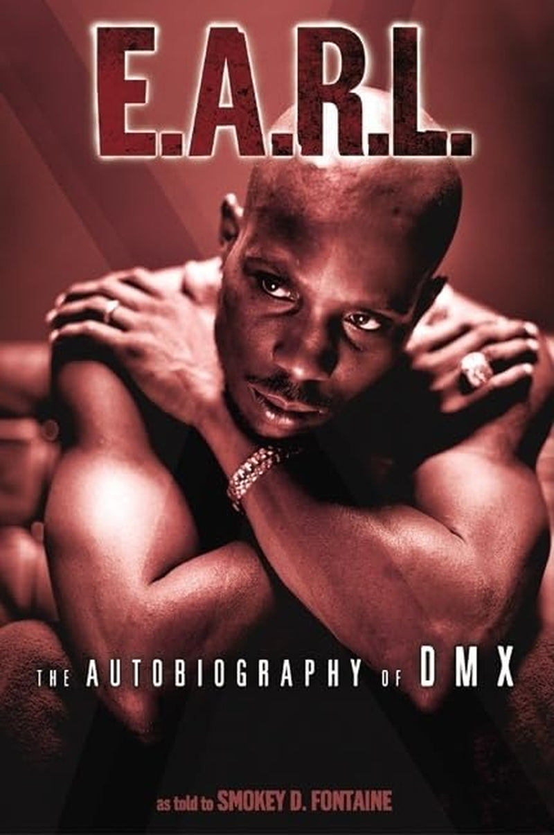 Book front cover of the book 'E.A.R.L. The Autobiography of DMX' featuring a photo of a solemn and stoic DMX seated shirtless with his arms crossed and looking into the distance.