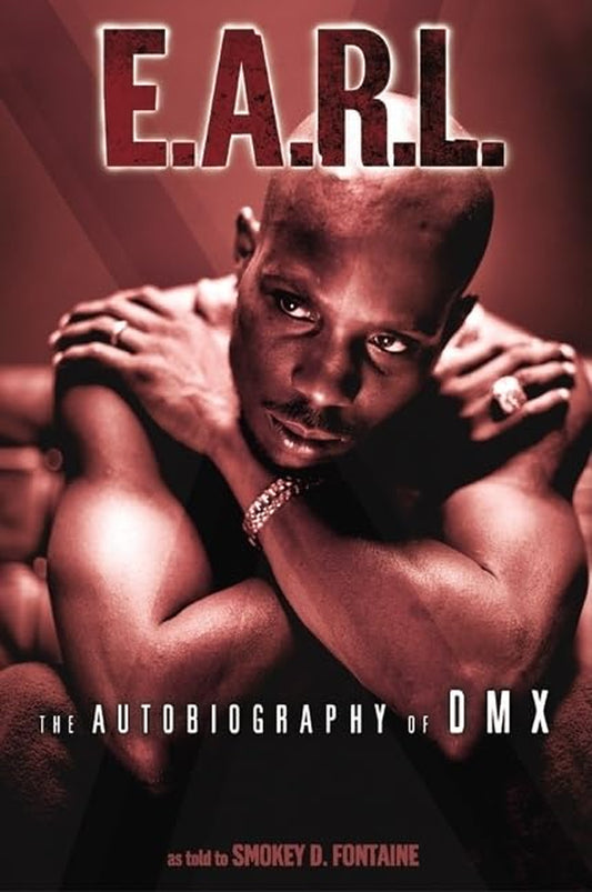 Book front cover of the book 'E.A.R.L. The Autobiography of DMX' featuring a photo of a solemn and stoic DMX seated shirtless with his arms crossed and looking into the distance.