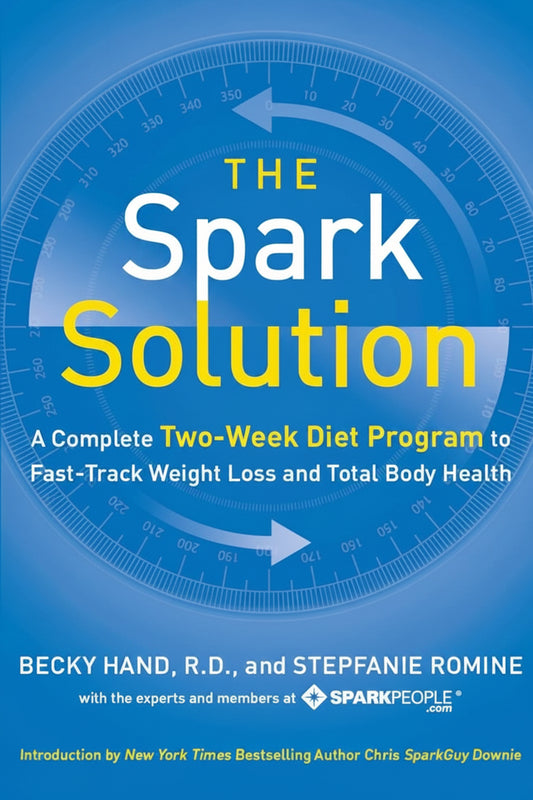 Book cover of 'The Spark Solution' with blue background and circular design