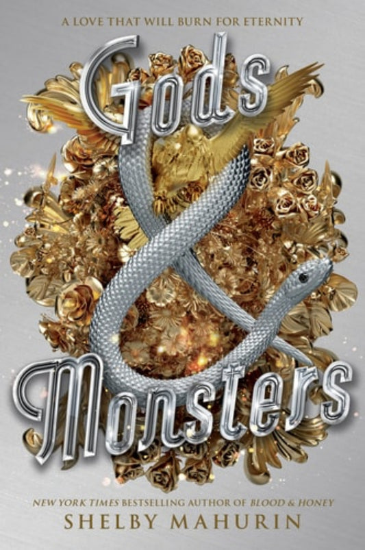 Book cover of 'Gods & Monsters' by Shelby Mahurin with a silver snake and gold roses on a gray background