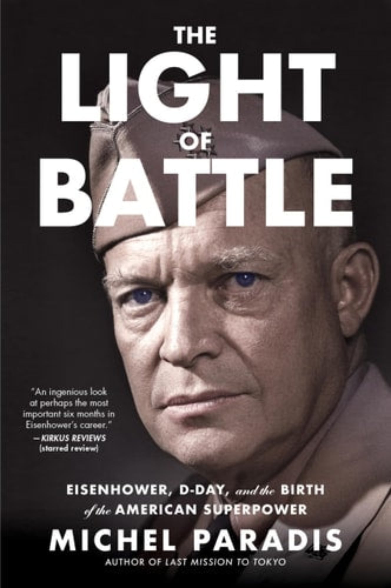 Book cover of 'The Light of Battle: Eisenhower, D-Day, and the Birth of the American Superpower' by Michel Paradis with a portrait of Eisenhower in military uniform and title text.