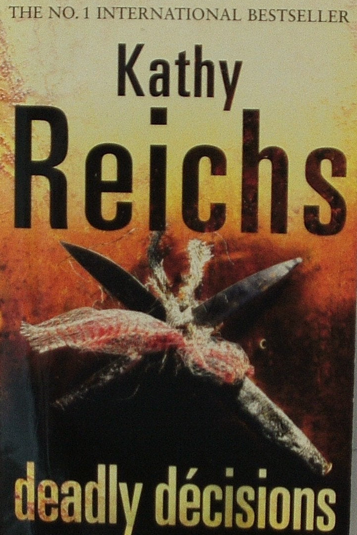 Book titled 'Deadly Decisions' by Kathy Reichs on a white background