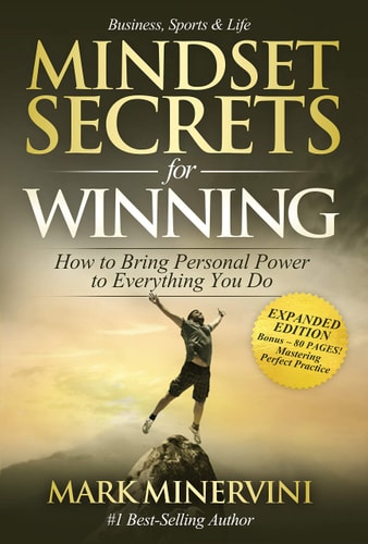 Book cover of 'Mindset Secrets for Winning' by Mark Minervini with a person on top of a mountain.