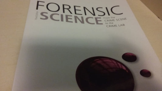 Book cover of 'Forensic Science' with a dark red stain on a light background