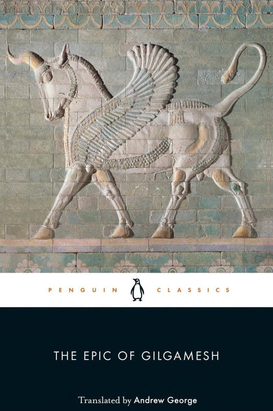 Front cover of the Penguin Classics edition of 'The Epic of Gilgamesh' by Andrew George, featuring a large relief carving of a winged bull on a tiled wall above a dark teal band with the title and Penguin logo.