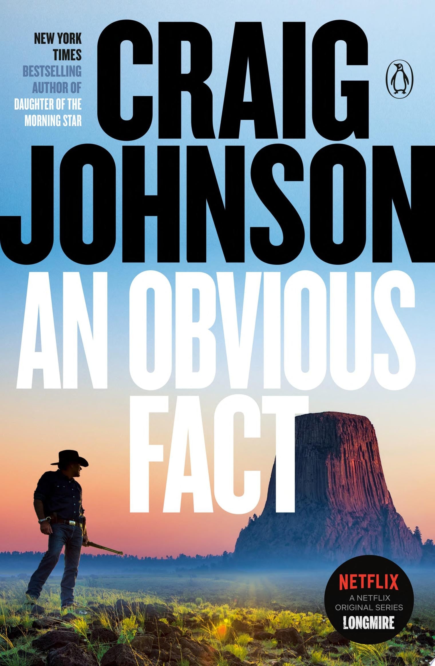Book cover of 'An Obvious Fact' by Craig Johnson with a silhouette of a man and a mountain.