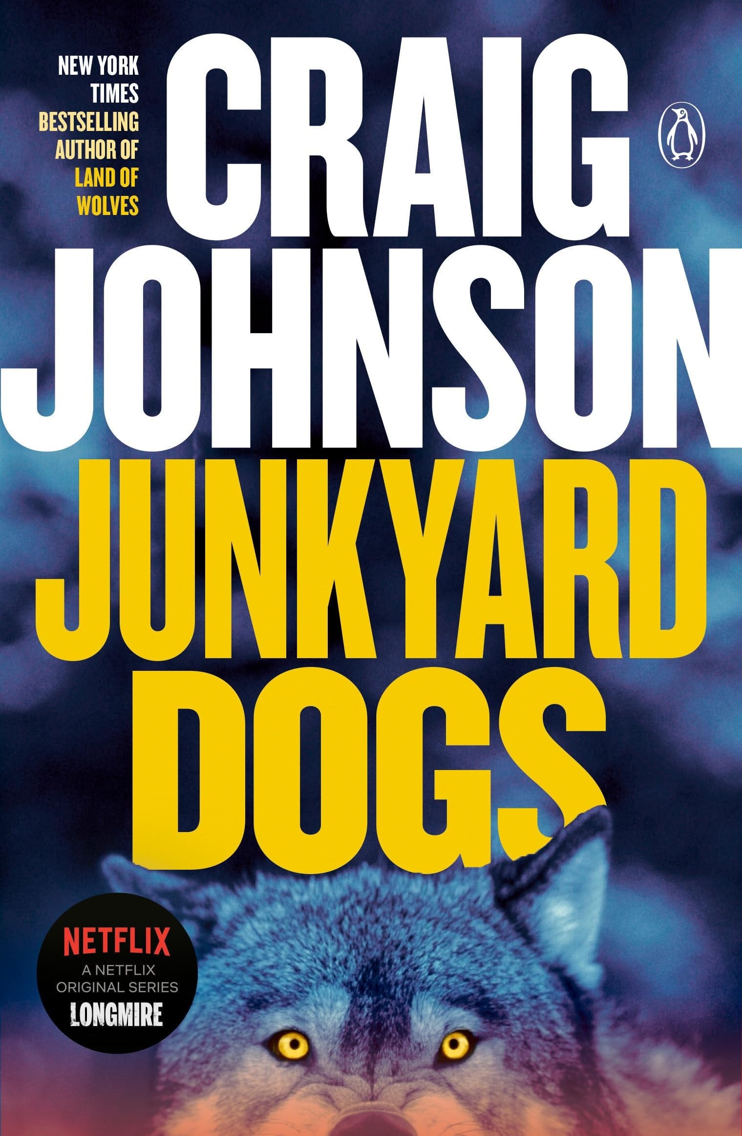 Book cover of 'Junkyard Dogs' by Craig Johnson with a wolf illustration.