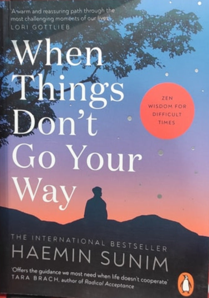 This image displays the cover of the book "When Things Don't Go Your Way: Zen Wisdom for Difficult Times" by Haemin Sunim. The cover design features a serene mountainous landscape with a silhouette of a person gazing towards the sky.