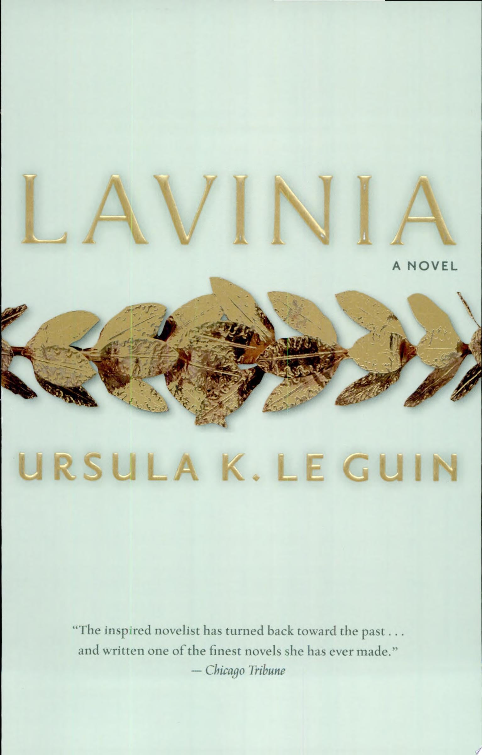 Book cover for the novel 'Lavinia' by Ursula K. Le Guin, featuring a pale mint-green background with gold serif lettering and a gold laurel wreath across the center.