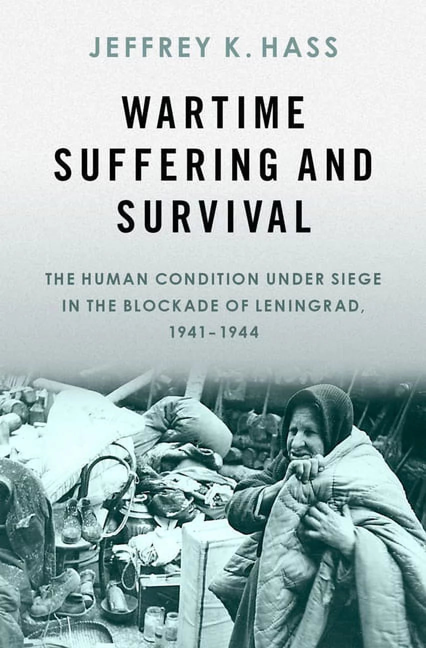 Book cover of 'Wartime Suffering and Survival' by Jeffrey K. Hass, featuring a black and white photograph of a person in distressed condition.