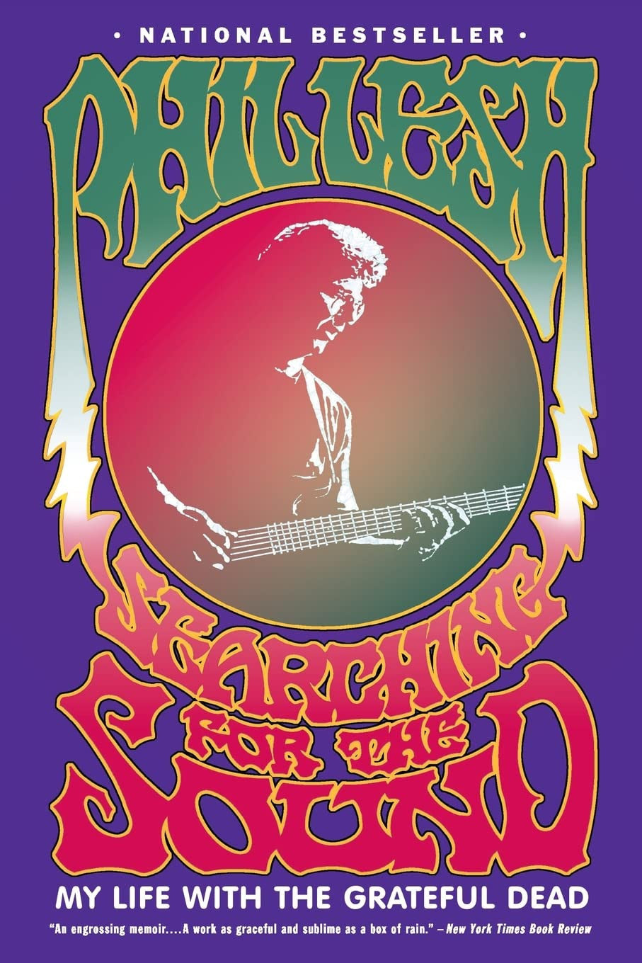 Book cover for 'Searching for the Sound: My Life with the Grateful Dead' by Phil Lesh, featuring a purple background with a large central red-to-green gradient circle containing a white silhouette of Phil Lesh playing an electric guitar. The title is written in large stylized red and yellow-orange lettering, and 'Phil Lesh' appears at the top in green.