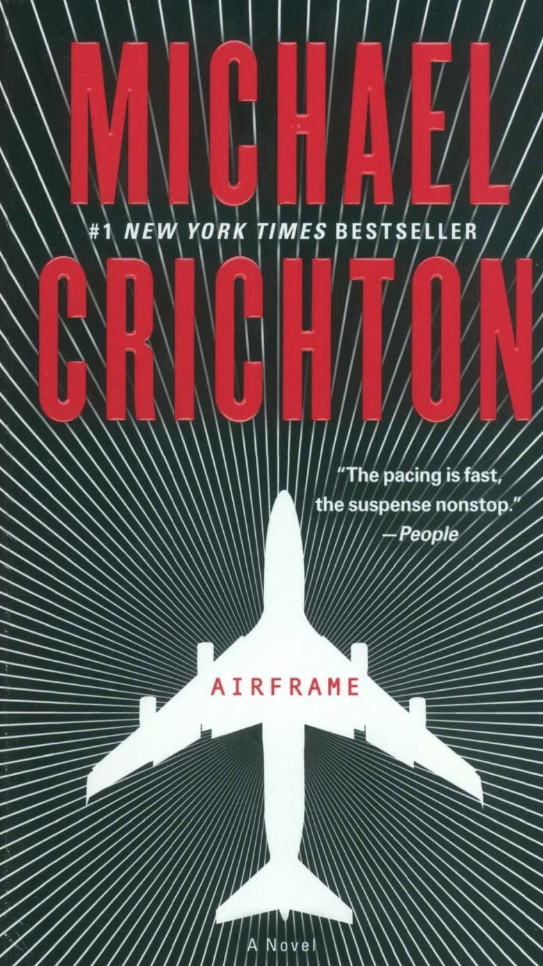 Book cover of 'Airframe' by Michael Crichton with airplane silhouette and text on a black background