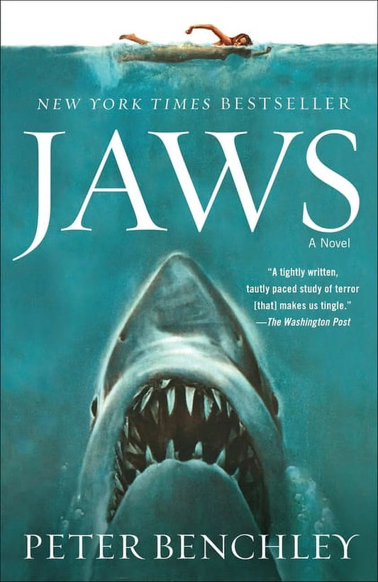 Book cover of 'Jaws' novel by Peter Benchley, featuring the image of a shark in the water.