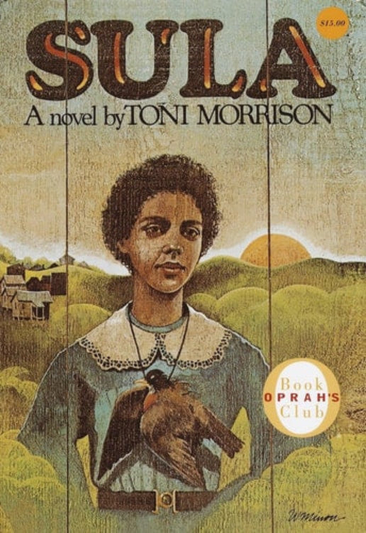 Cover of the book 'Sula: A Novel' by Toni Morrison, featuring an illustration of a young Black girl with short hair, holding a bird, with a rustic, wooden cabin and a landscape in the background.