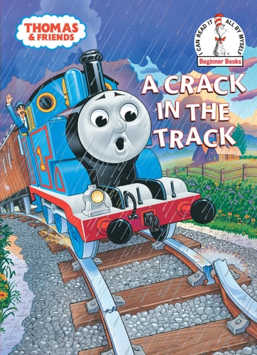 Cover of the book 'A Crack in the Track' featuring animated train characters from the Thomas & Friends series. The cover shows a blue engine with a surprised expression, sitting on a track with a rainstorm in the background.