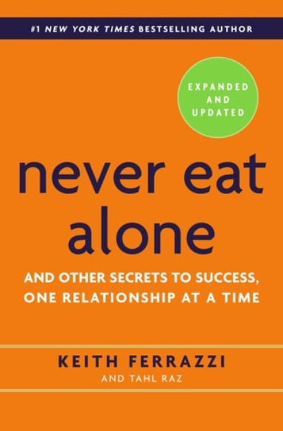 The cover of the book 'Never Eat Alone, Expanded and Updated: And Other Secrets to Success, One Relationship at a Time' by Keith Ferrazzi and Tahl Raz.
