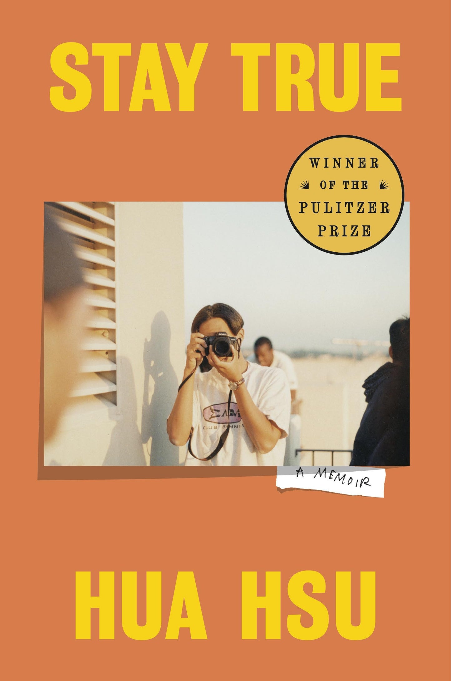Book cover of 'Stay True' by Hua Hsu with a Pulitzer Prize badge on an orange background.