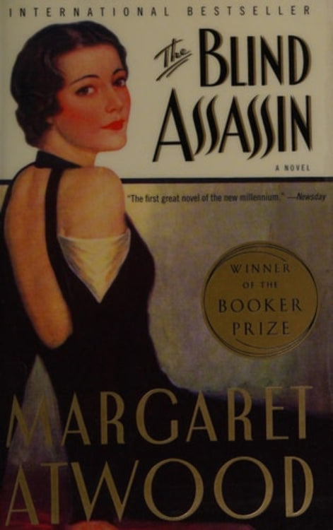 This image features the cover of Margaret Atwood's novel, "The Blind Assassin." The cover design is sophisticated and evocative, showcasing a profile portrait of a young woman from the 1940s who is the central character, Laura Chase.