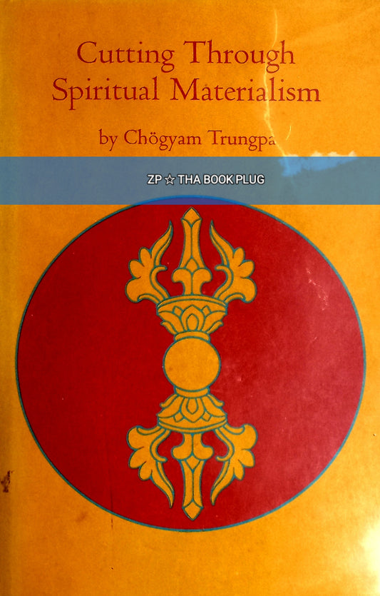 A book cover of 'Cutting Through Spiritual Materialism' by Chögyam Trungpa, featuring a red and yellow design with a decorative element in the center.