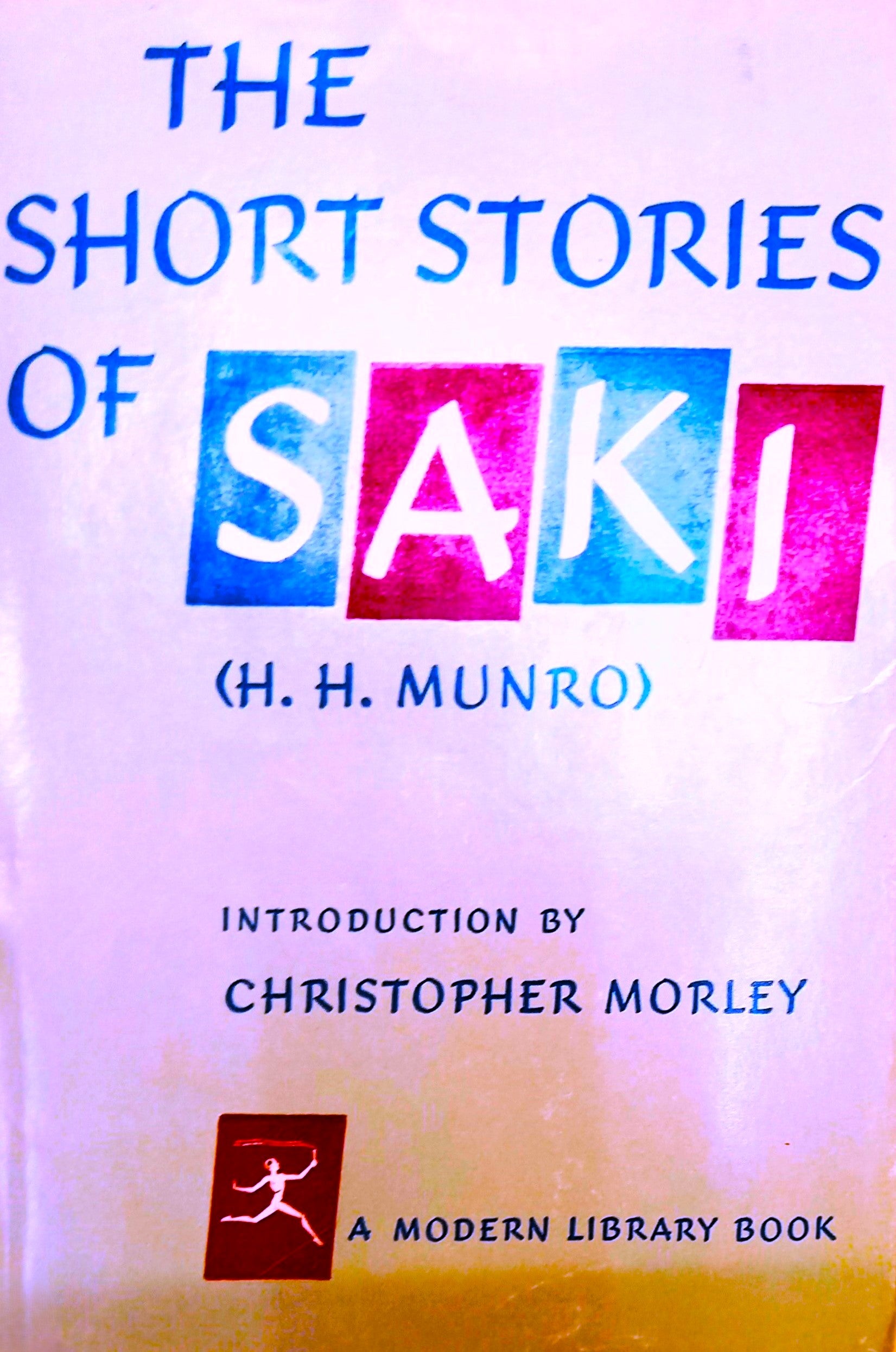 Book cover of 'The Short Stories of Saki' by H.H. Munro with colorful text design on a purple background.