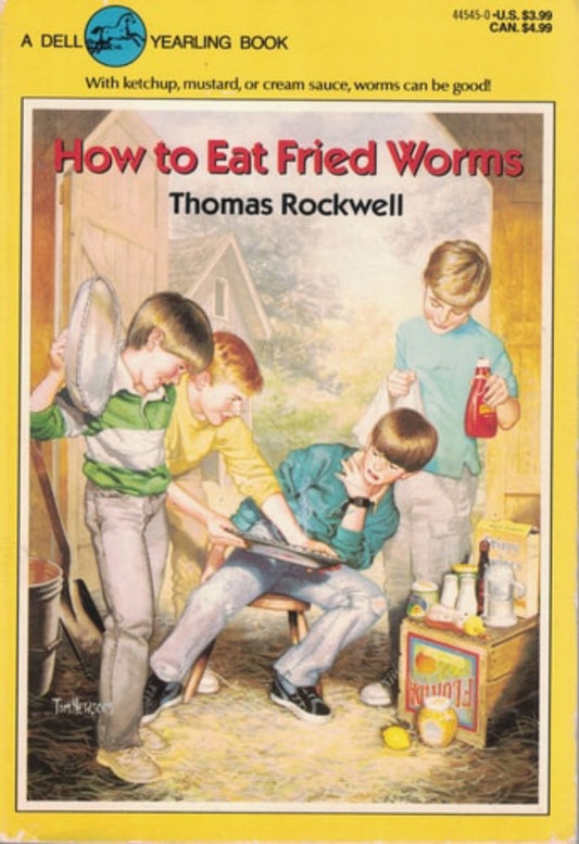 Book cover of 'How to Eat Fried Worms' by Thomas Rockwell featuring illustrations of two boys inside a classroom setting, with one boy holding a worm and the other looking distressed. The title and author's name, Thomas Rockwell, are displayed.