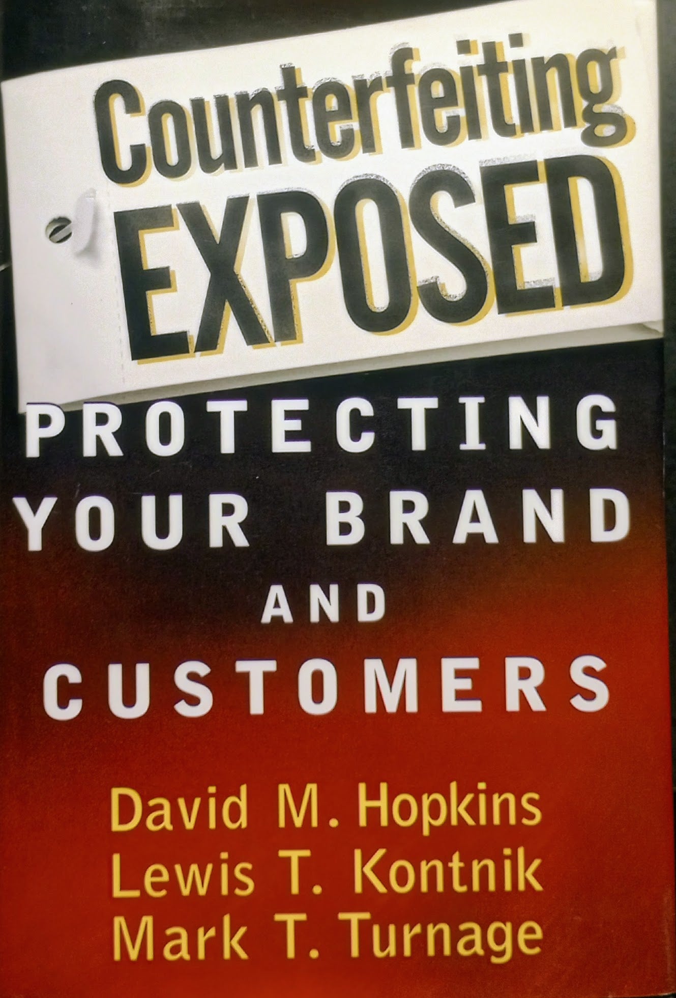 Book cover of 'Counterfeiting Exposed' by David M. Hopkins, Lewis T. Kontnik, and Mark T. Turnage.