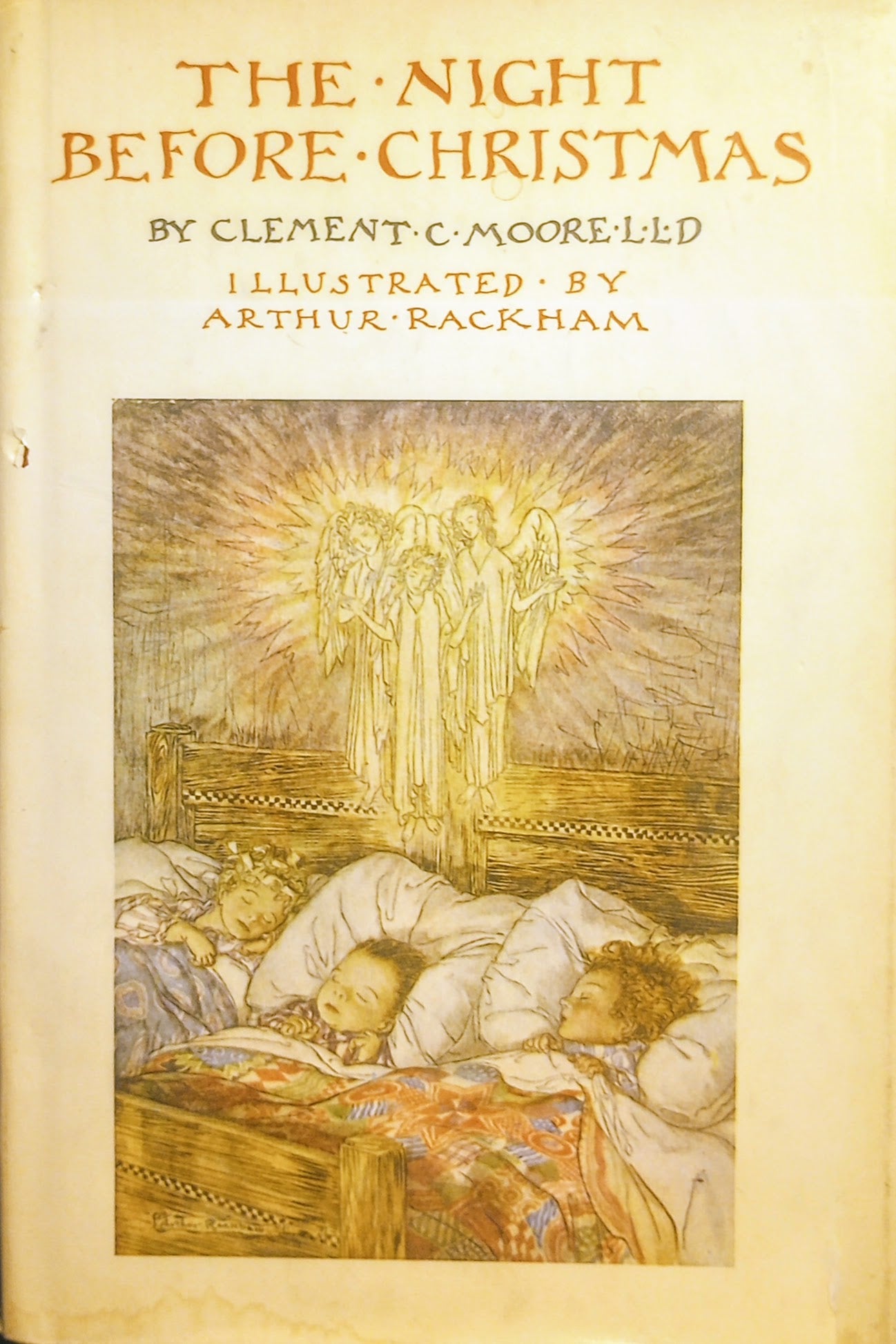 Book cover of 'The Night Before Christmas' with illustration of angels and sleeping child, featuring Arthur Rackham's artwork.
