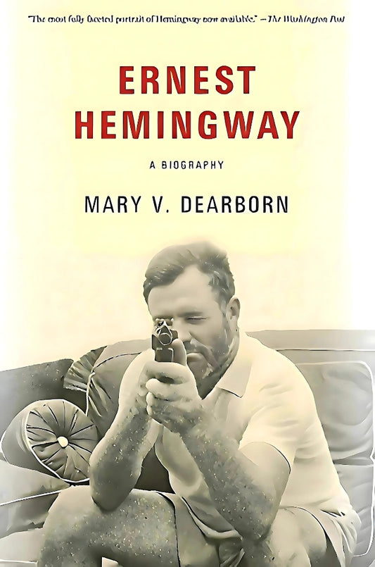 The cover of the book 'Ernest Hemingway: A Biography' by Mary V. Dearborn featuring a black and white photo of Ernest Hemingway.