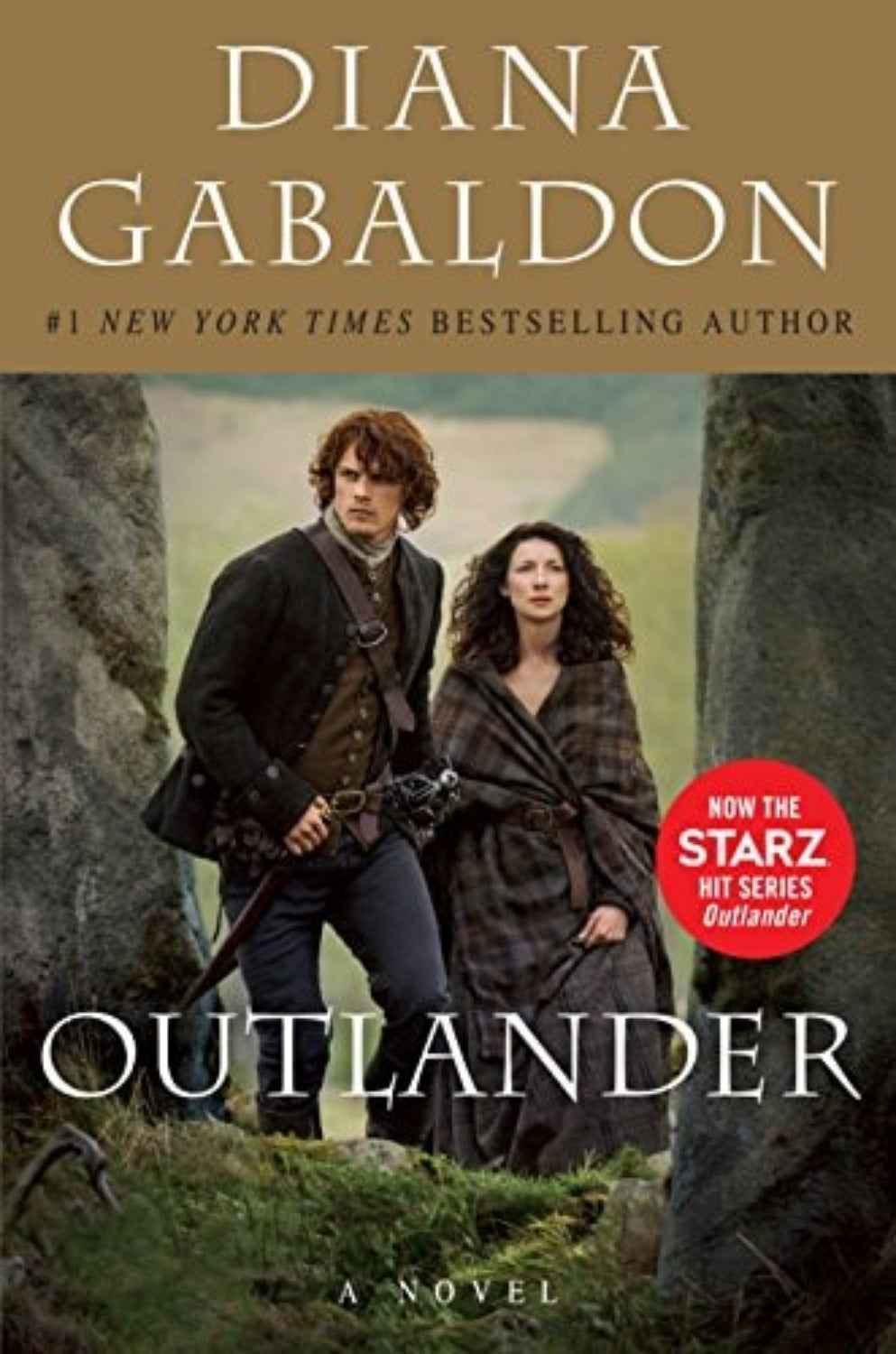 Book cover of 'Outlander' by Diana Gabaldon featuring two characters in a natural setting.