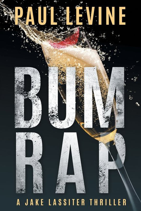 Book cover of the book "Bum Rap: A Jake Lassiter Thriller" by Paul Levine, featuring an action photo of a glass of champagne overflowed with the liquid contents of the champagne flute spilling out in an upward trajectory.