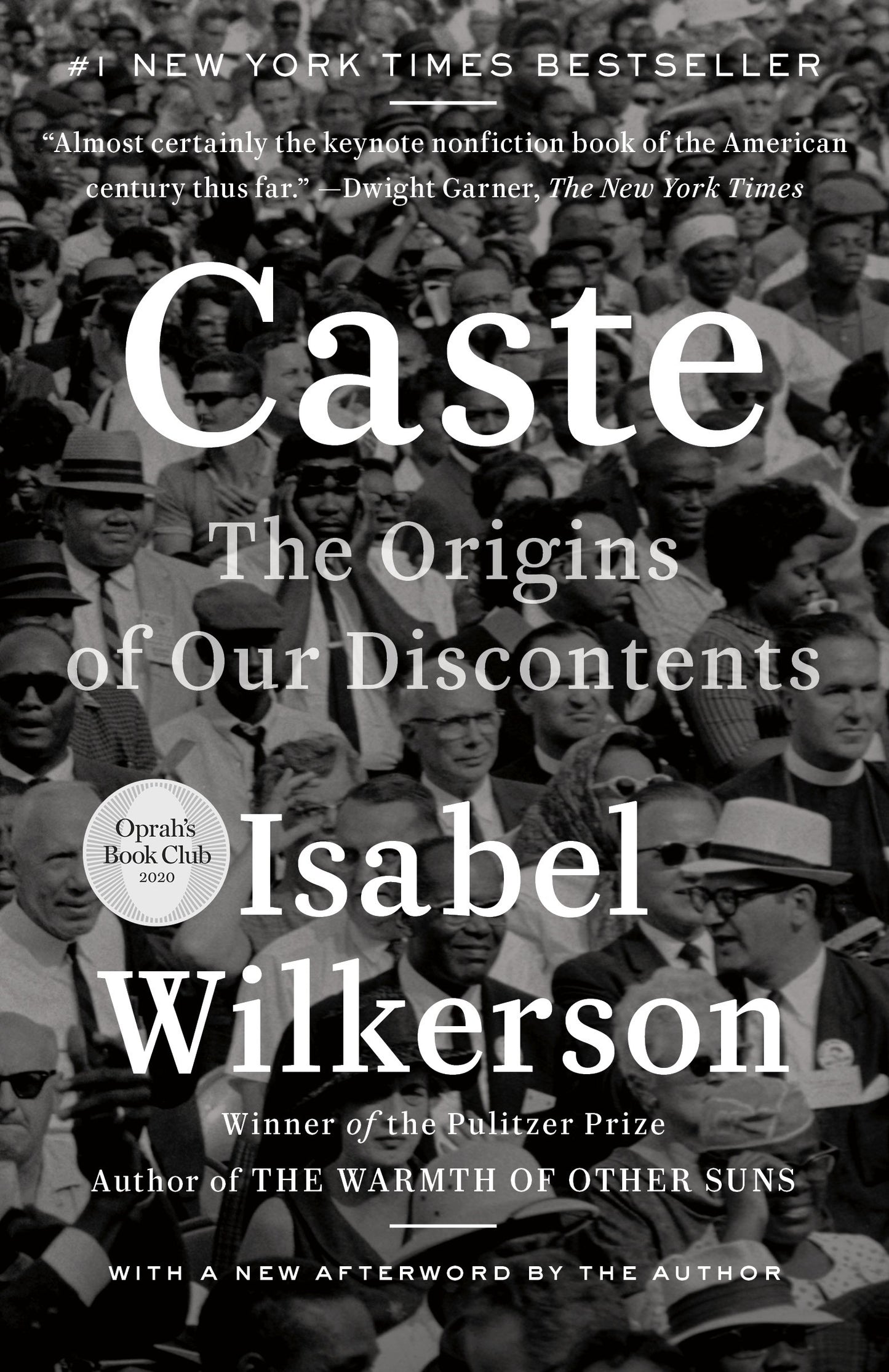 Book cover of 'Caste' by Isabel Wilkerson with a black and white photo of a crowd.