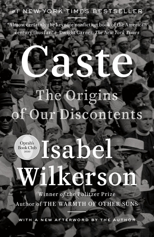 Book cover of 'Caste' by Isabel Wilkerson with a black and white photo of a crowd.