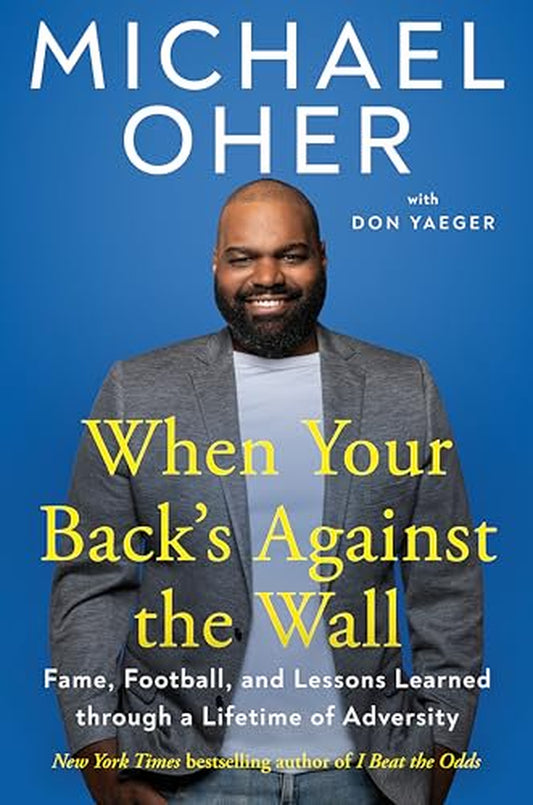 Book cover of 'When Your Back's Against The Wall' by Michael Oher with Don Yaeger. The cover features a portrait of Michael Oher with a blue background.