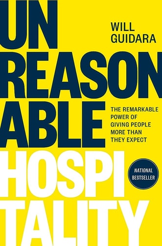 Book cover of 'Unreasonable Hospitality' by Will Guidara with a yellow background and blue text.