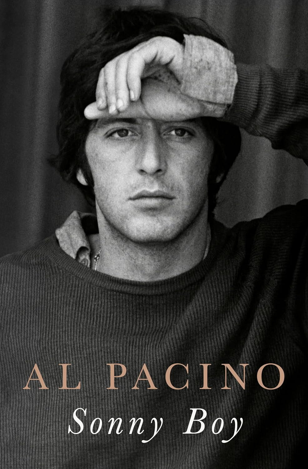 The image shows the cover of the book 'Sonny Boy: A Memoir [ISBN: 9780593655115]' by Al Pacino. It features a black and white photo of Al Pacino with his hand behind his head, looking off to the side.