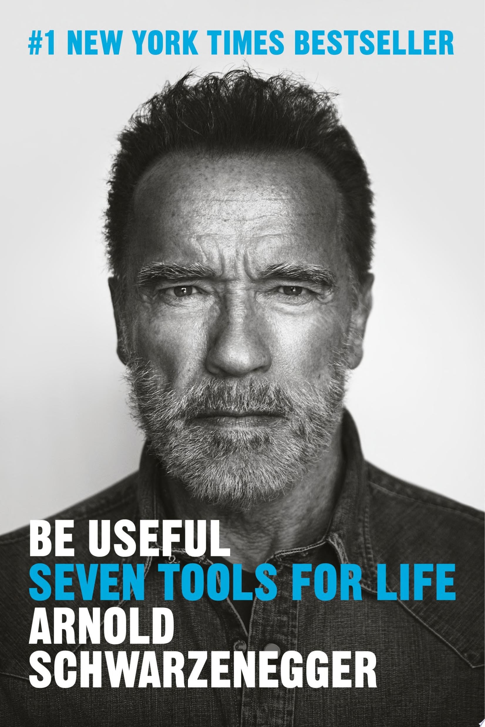 Book front cover of book 'Be Useful: Seven Tools For Life' featuring a black, blue, and white portrait of Arnold Schwarzenegger with text about a New York Times Bestseller.