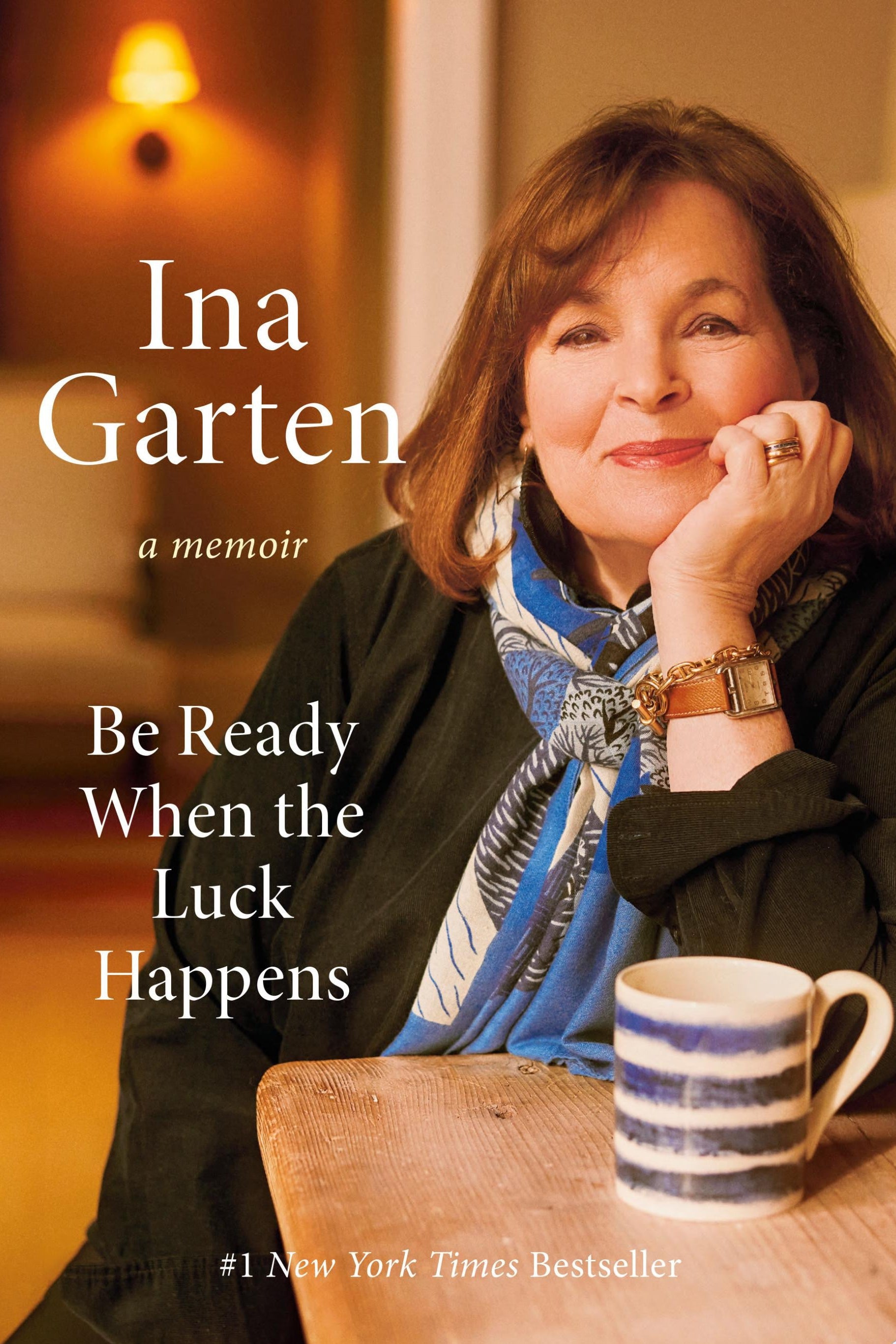 Book cover featuring a woman with a mug and text about 'Be Ready When the Luck Happens' by Ina Garten